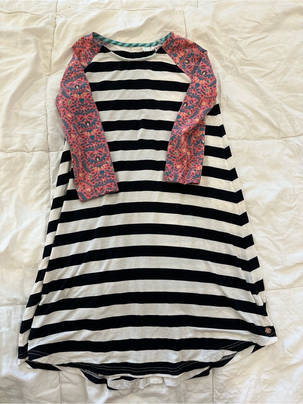 Black and white striped dress with patterned sleeves